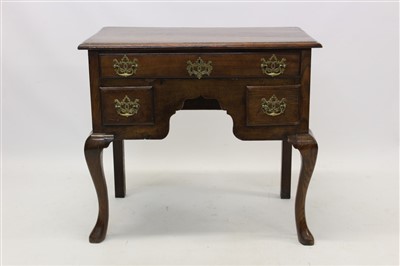 Lot 1614 - 18th century oak lowboy