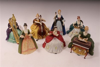 Lot 2208 - Collection of seven Royal Doulton figures to include - Virginals HN2427, Harp HN2482, Cello HN2331, Flute HN2483, Cymbals HN2699, Hurdy-Gordy HN2796 and Chitarrone HN2700, each with stand and box