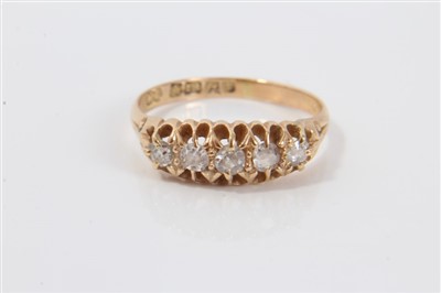 Lot 3338 - Gold (18ct) diamond five stone ring