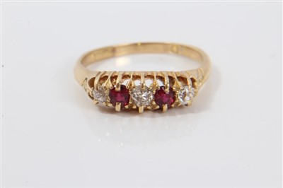 Lot 3339 - Ruby and diamond five stone ring