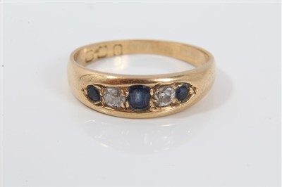 Lot 3372 - Gold (18ct) sapphire and diamond five stone ring