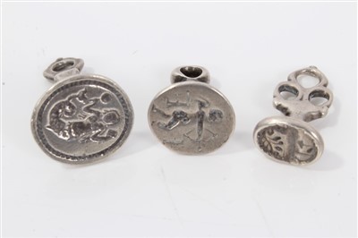 Lot 3379 - Three Georgian white metal seal fobs