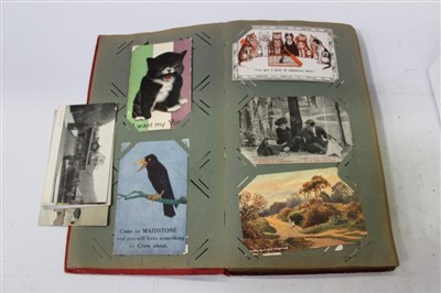 Lot 2552 - Postcards in album plus some Military ephemera