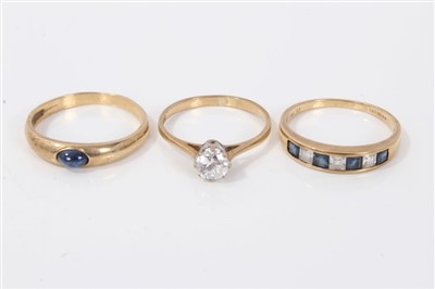 Lot 3393 - Three gold (9ct) gem set dress rings