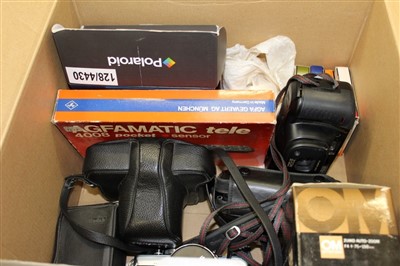 Lot 3792 - Quantity of cameras and photographic equipment – including two Olympus 35mm SLRS with standard lenses, an Olympus 75-150mm 200m lens, a polaroid digital camera, a boxed Agfamatic Tele and other ite...