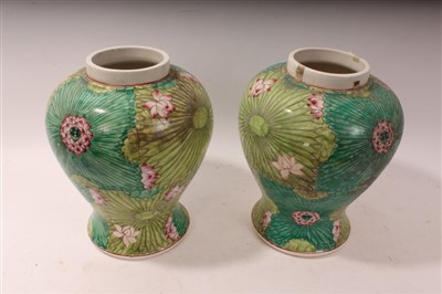 Lot 2201 - Pair of large 20th century Oriental vases with floral decoration on green ground, 30cm high