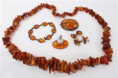 Lot 3437 - Raw amber bead necklace and other silver mounted amber jewellery