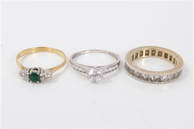 Lot 3444 - Gold (18ct) emerald and diamond dress ring and two other rings