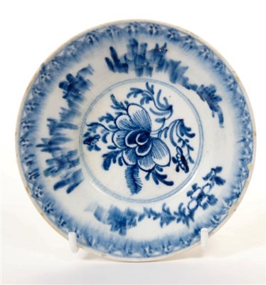 Lot 163 - 18th century Bow blue and white patty pan with floral spray decoration, 10.6cm diameter