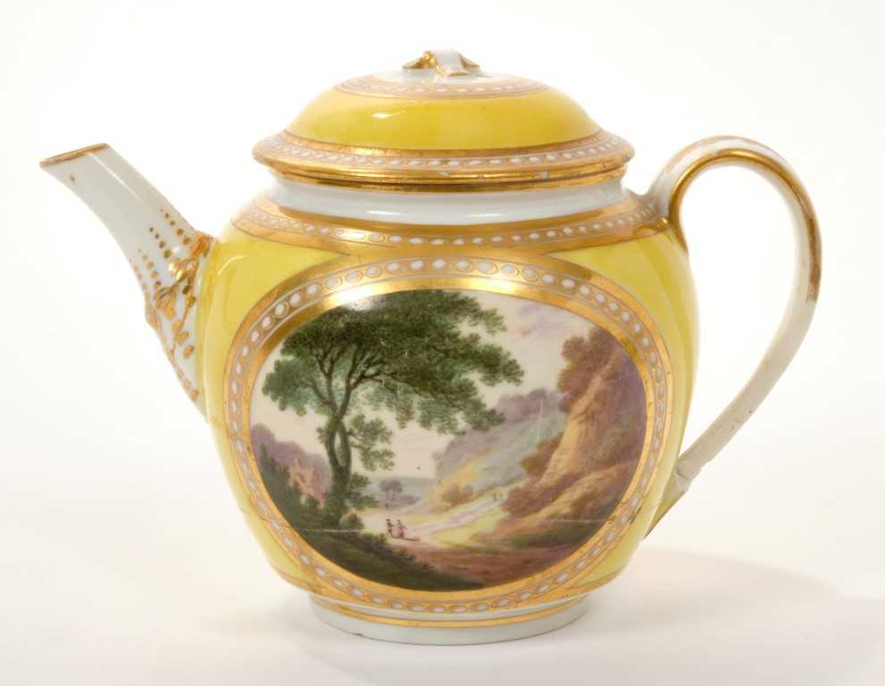 Lot 169 - 18th century Derby yellow ground teapot and cover with painted landscape reserves, entitled on base ‘View of Inglesby & Foremark both in Derbyshire’, within gilt borders, 16cm