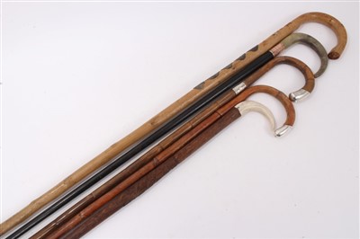 Lot 992 - Group of walking sticks including one with rose gold mount