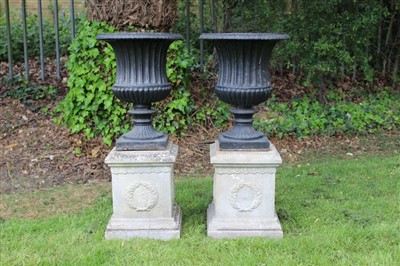 Lot 1530 - Pair of cast iron urns