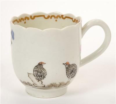 Lot 180 - 18th century Worcester coffee cup, polychrome two quail, rock and floral decoration, 6.2cm