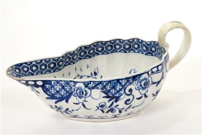 Lot 126 - 18th century Worcester blue and white ‘full moon’ pattern sauce boat