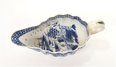 Lot 186 - 18th century Worcester blue and white ‘full moon’ pattern sauce boat and ‘floral spray’ pattern dish