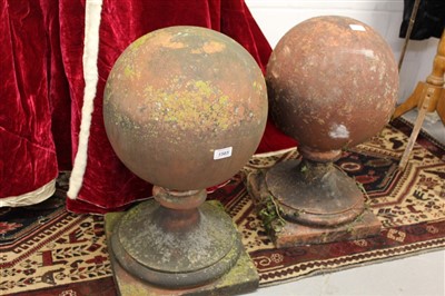 Lot 1565 - Pair of antique terracotta finials on pedestal bases, 57cm