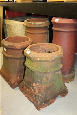 Lot 1567 - Pair of terracotta chimney pots of octagonal form, 44cm high, together with two others (4)