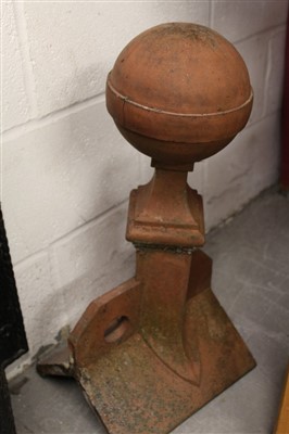 Lot 1585 - Victorian terracotta ridge tile roof finial with ball terminal, 60cm tall