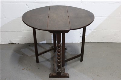 Lot 1464 - Late 17th century oak gateleg table, elliptical drop-leaf top on bobbin-turned end supports with primitive square section gates, 80cm wide