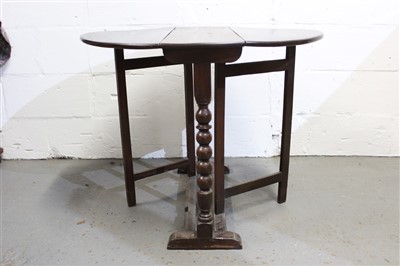 Lot 1464 - Late 17th century oak gateleg table, elliptical drop-leaf top on bobbin-turned end supports with primitive square section gates, 80cm wide