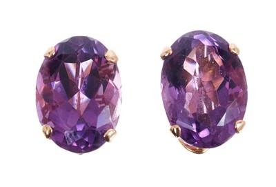 Lot 582 - Amethyst and gold ear clips