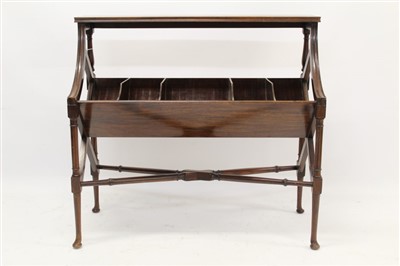 Lot 1473 - Early 20th century mahogany standing book trough with shelf and division trough raised on turned legs with pad feet, united by X-stretcher