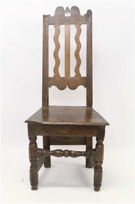 Lot 1479 - Late 17th century primitive oak side chair with undulating top rail and heavy vertical splat solid seat on turned and block understructure