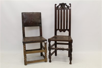 Lot 1480 - Late 17th century oak side chair with pierced scrolling cresting and vertical splat back, solid seat on turned and block understructure, together with Cromwellian-style oak and leather side chair (...