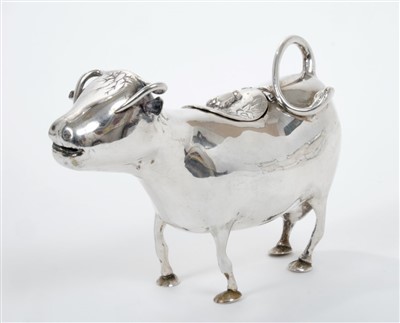 Lot 393 - 19th century Continental silver (800) cow creamer of conventional form