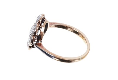 Lot 647 - Diamond cluster ring with a flower-head cluster of old cut diamonds