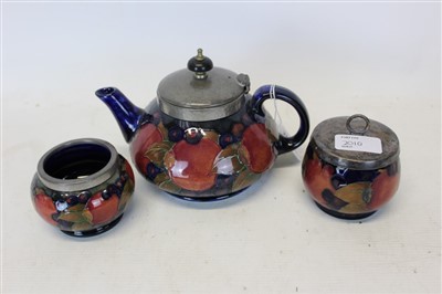 Lot 2010 - Moorcroft pomegranate teapot and two bowls
