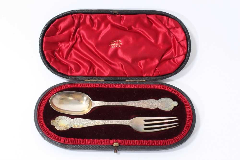 Lot 356 Victorian silver spoon and fork set, cased,