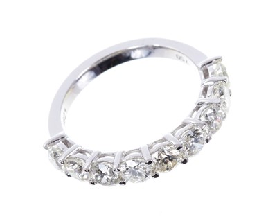 Lot 664 - Diamond half eternity ring, 1.93cts