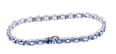 Lot 614 - Sapphire and diamond bracelet