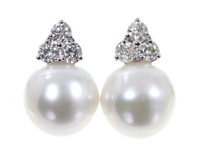 Lot 665 - Pair of South Sea cultured pearl and diamond earrings