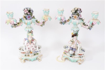 Lot 68 - Pair late 19th century Dresden figural twin-branch porcelain candelabras