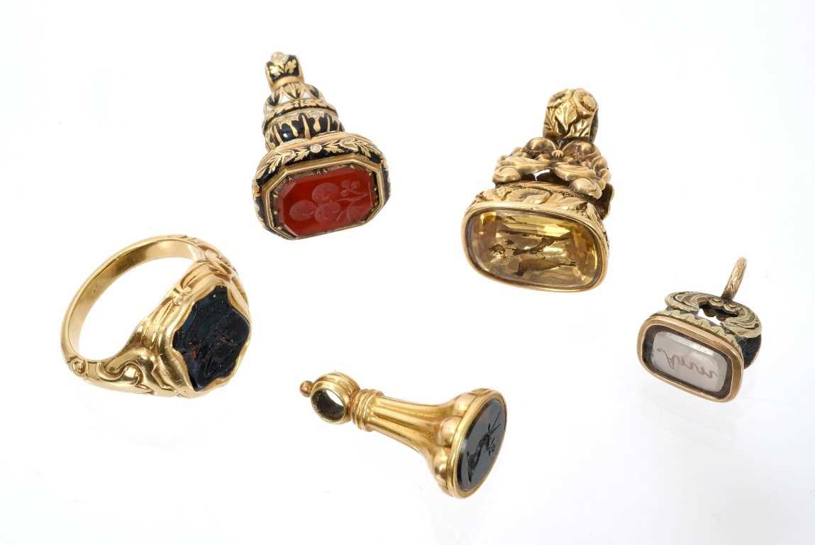 Lot 598 - Four 19th century seals and a signet ring