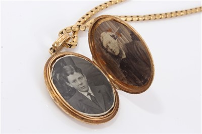 Lot 599 - Engraved gold locket on chain