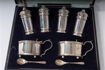 Lot 462 - 1920s six piece silver condiment set in fitted case - London 1922