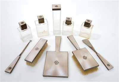 Lot 457 - Asprey silver and enamel ten piece dressing table set