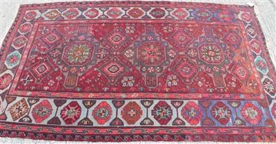 Lot 1674 - Unusual Persian design knotted wool rug