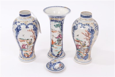 Lot 218 - Garniture of three late 18th century Chinese export famille rose vases, one cover, 14cm -15cm