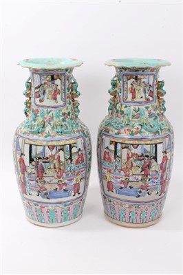 Lot 223 - Pair of 19th century Canton vases with temple lion handles, 41cm