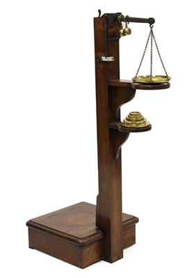 Lot 1544 - Set of Regency mahogany Jockey scales with brass mounts, and plaque for Young & Sons, with five original weights