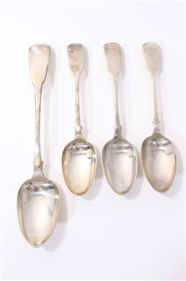 Lot 228 - George III silver fiddle pattern basting spoon and three similar tablespoons