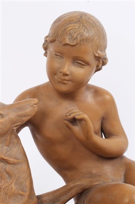 Lot 1044 - Ugo Cipriani (1887-1960) terracotta sculpture of a child with a dog, on plinth base. Signed