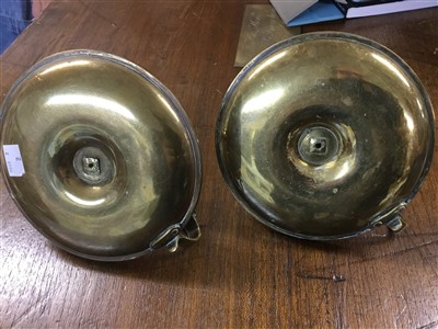 Lot 125 - Pair of Victorian Royal brass chamber candlesticks from Buckingham Palace, of circular form