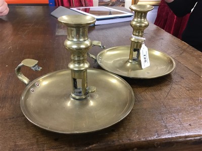 Lot 125 - Pair of Victorian Royal brass chamber candlesticks from Buckingham Palace, of circular form
