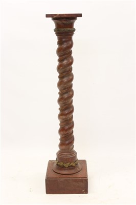 Lot 1549 - 19th century rouge marble column of spiral form with gilt metal mounts, on square base