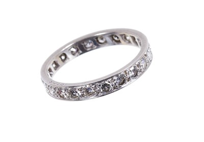 Lot 576 - Diamond eternity ring with a full band of twenty-two single cut diamonds